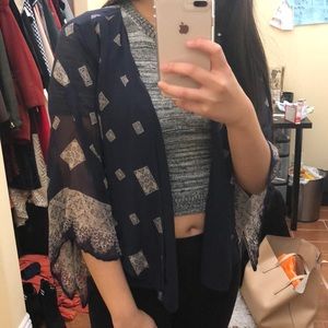 Navy blue blazer with tan accents